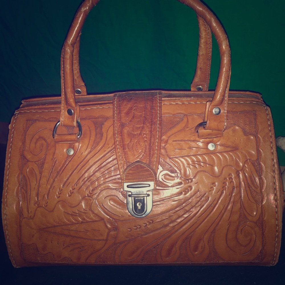 Vintage embossed leather bag with floral design